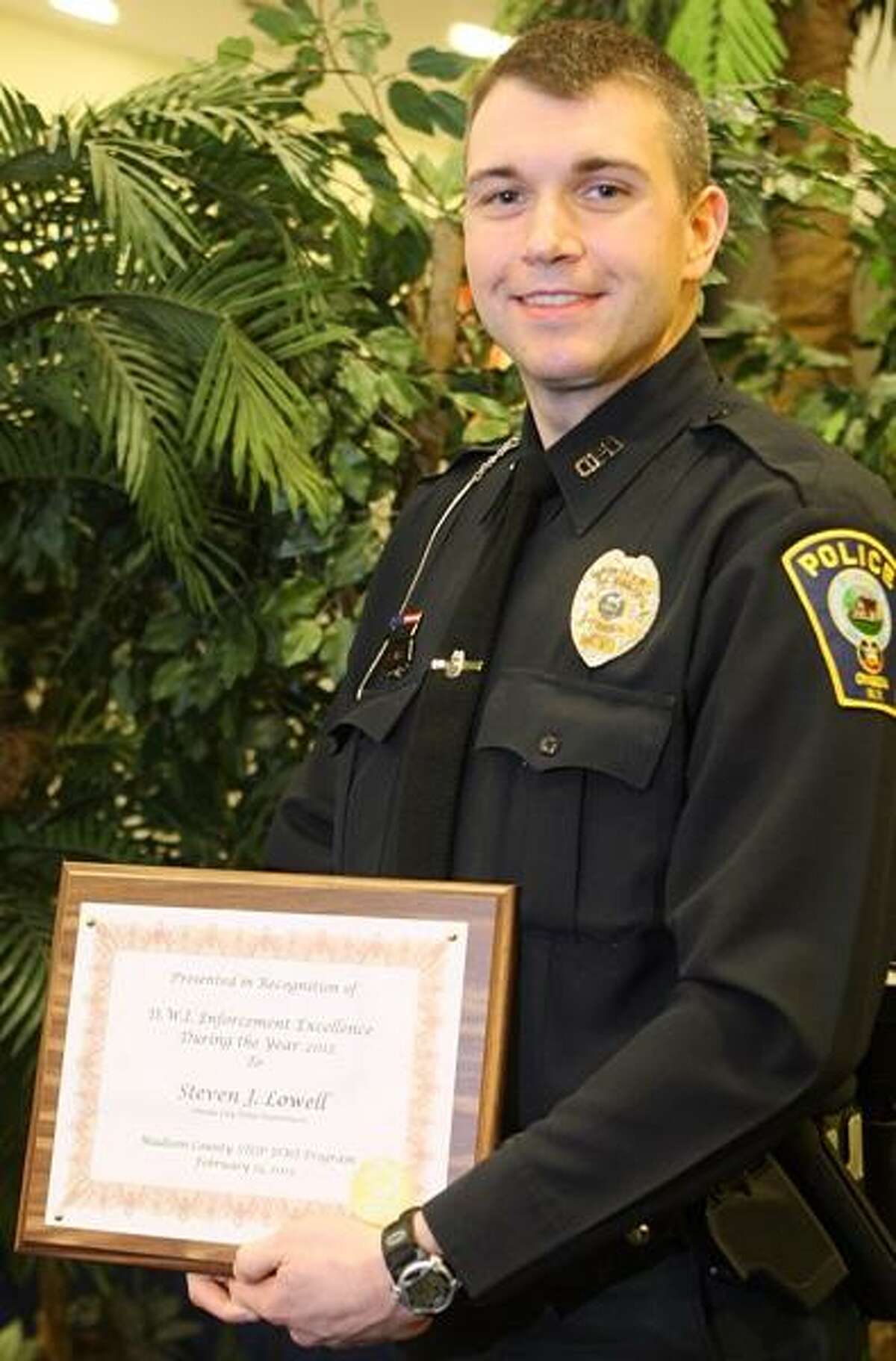 JOHN HAEGER @oneidaphoto on Twitter/Oneida Daily Dispatch Steven Lowell of the Oneida City Police Department was this year's recipient of the Karl Taylor award for his Stop DWI work.