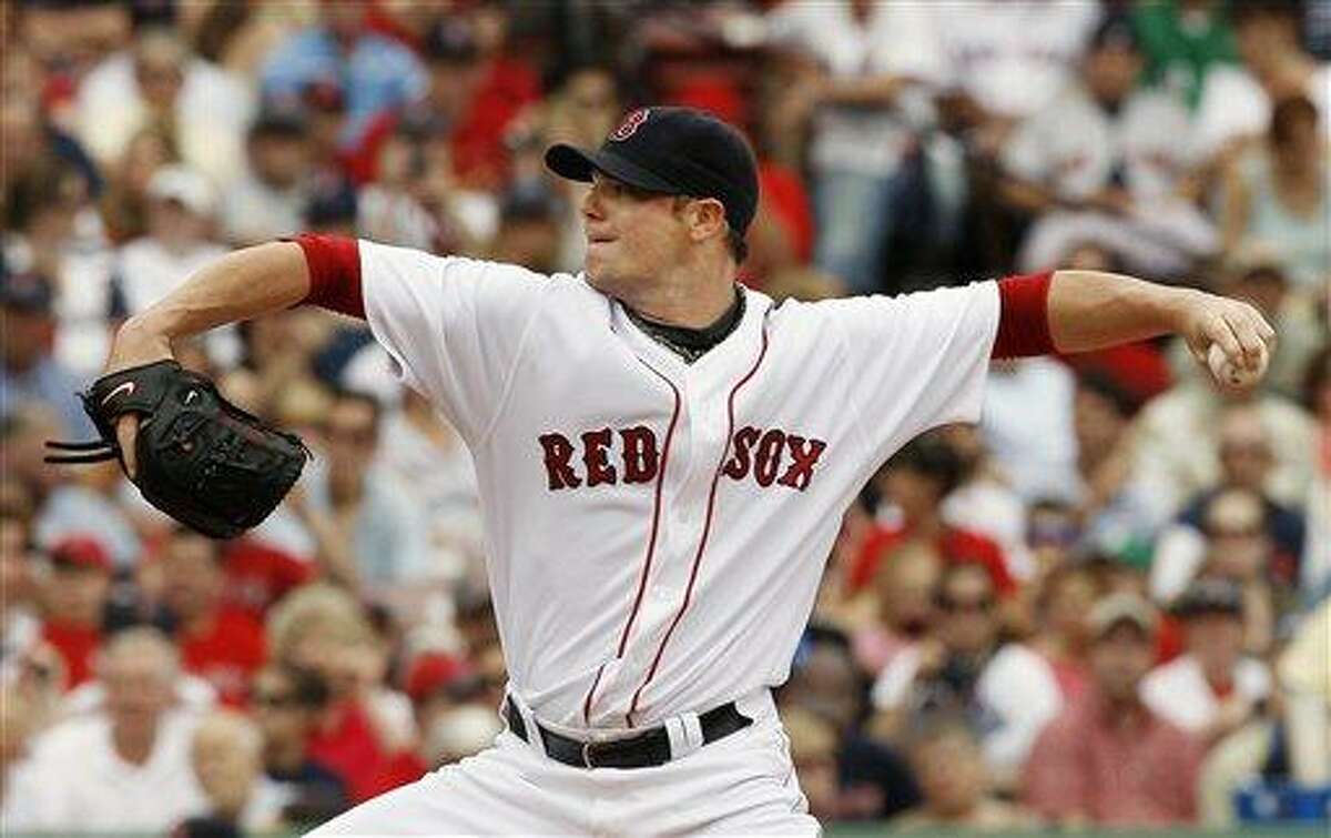 Boston Red Sox's John Lester pitches against the St. Louis Cardinals in a baseball game at Fenway Park in Boston, Sunday, June 22, 2008. (AP Photo/Winslow Townson)