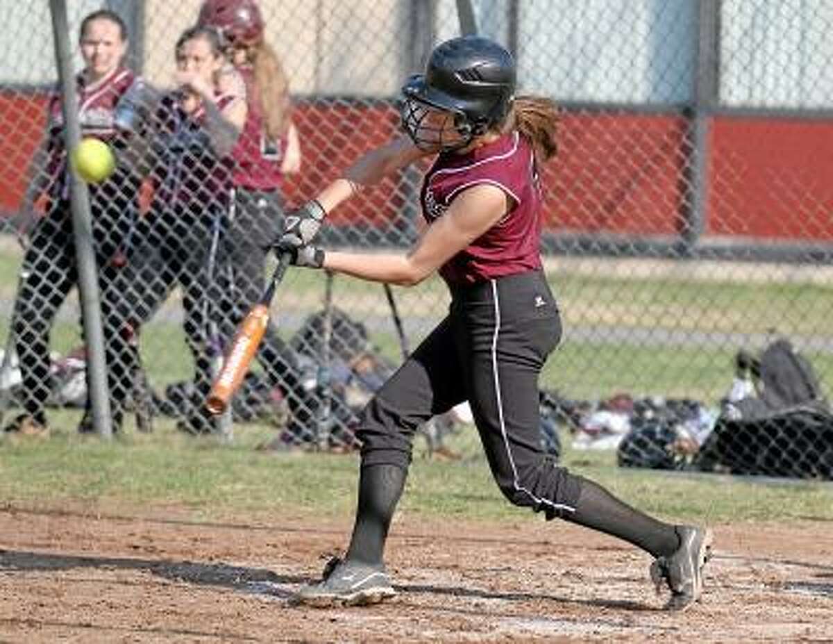Marianne Killackey/Special to the Register Citizen Torrington's Brittany Young smashes a triple for two RBI's in her team's win over Wilby in the first game of a double header Monday afternoon.