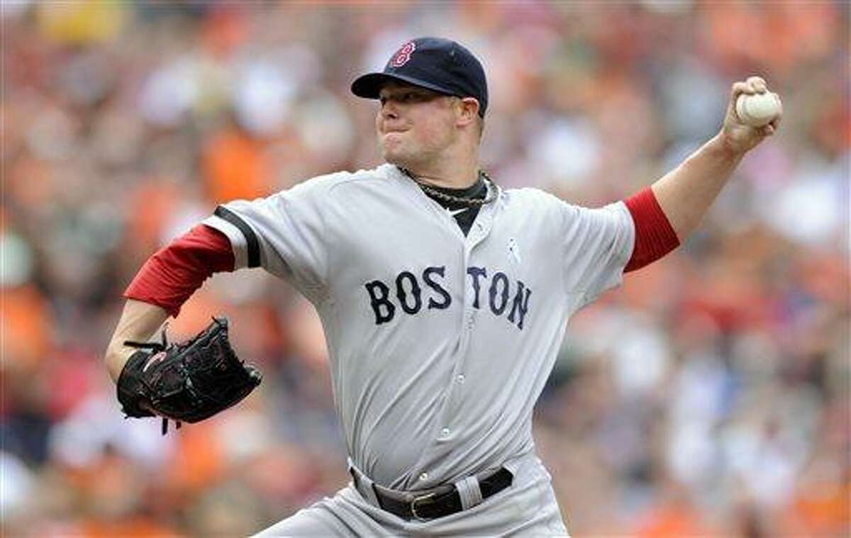 Baseball jersey worn by Boston Red Sox pitcher Jon Lester