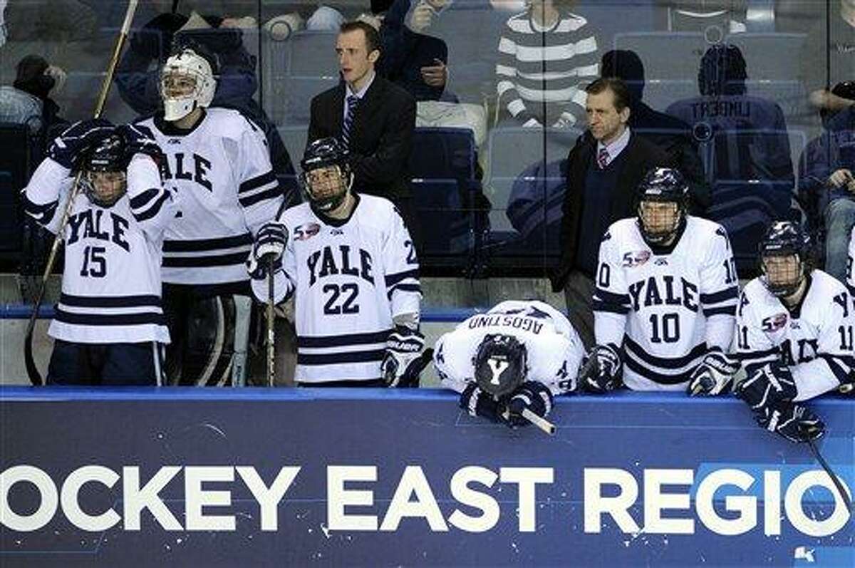 The Yale bench reacts late in the third period of their 5-3 loss to Minnesota-Duluth in an East regional final game in the NCAA college hockey tournament in Bridgeport, Conn., on Saturday, March 26, 2011. (AP Photo/Fred Beckham)
