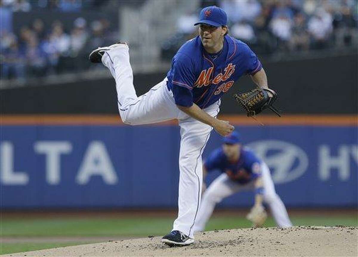 New York Mets' Shaun Marcum delivers a pitch during the first inning of a baseball game against the Chicago Cubs Friday, June 14, 2013, in New York. (AP Photo/Frank Franklin II)