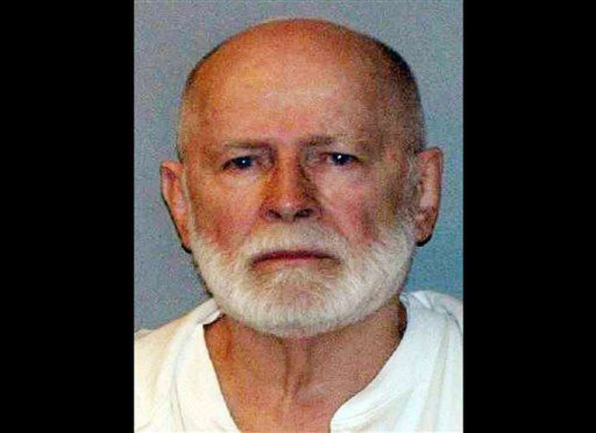 This June 23, 2011 booking photo provided by the U.S. Marshals Service shows James "Whitey" Bulger, one of the FBI's Ten Most Wanted fugitives, captured in Santa Monica, Calif., after 16 years on the run. Opening arguments in Bulger's trial begin Wednesday, June 12, 2013 in federal court in Boston. (AP Photo/ U.S. Marshals Service, File)
