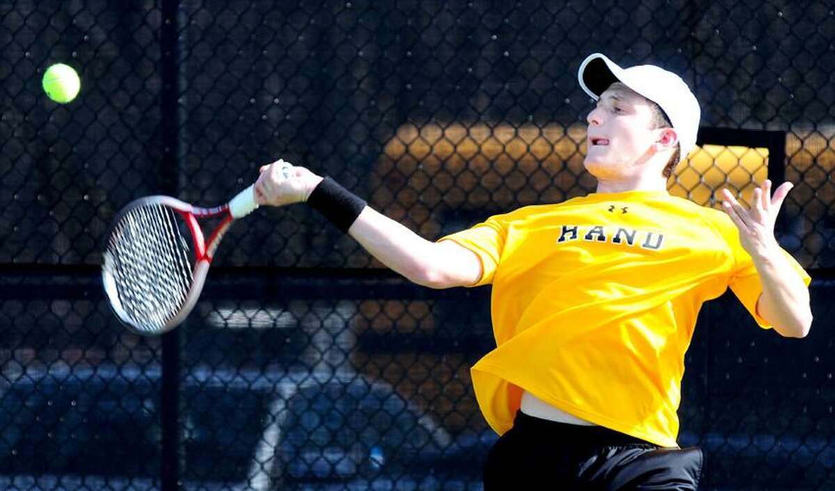 Scott Rubinstein of Hand hits a forehand to Phil Hochman of Amity during a singles match won by Rubinstein. Hand won the match. Photo by Arnold Gold/New Haven Register