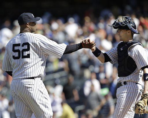 C.C. Sabathia of the Cleveland Indians, right, talks to catcher News  Photo - Getty Images