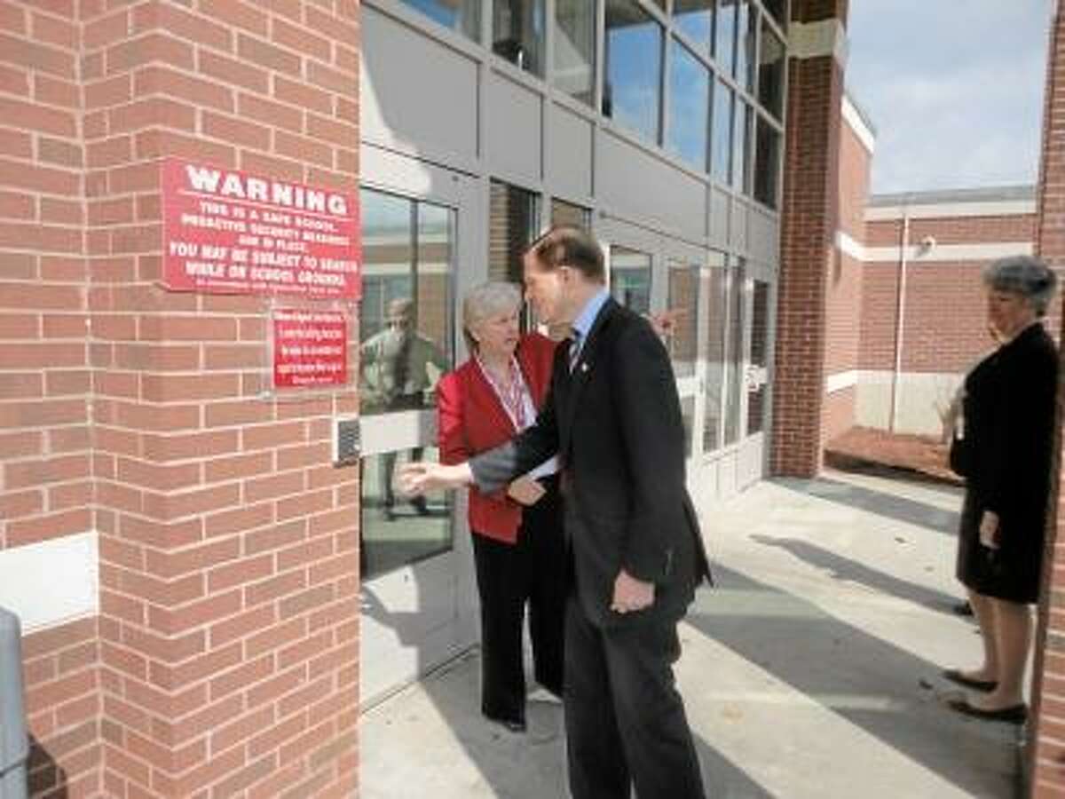 JASON SIEDZIK/ Register Citizen Sen. Richard Blumenthal's tour of Northwestern Regional Middle and High School's security measures started with the buzzer at the front door.