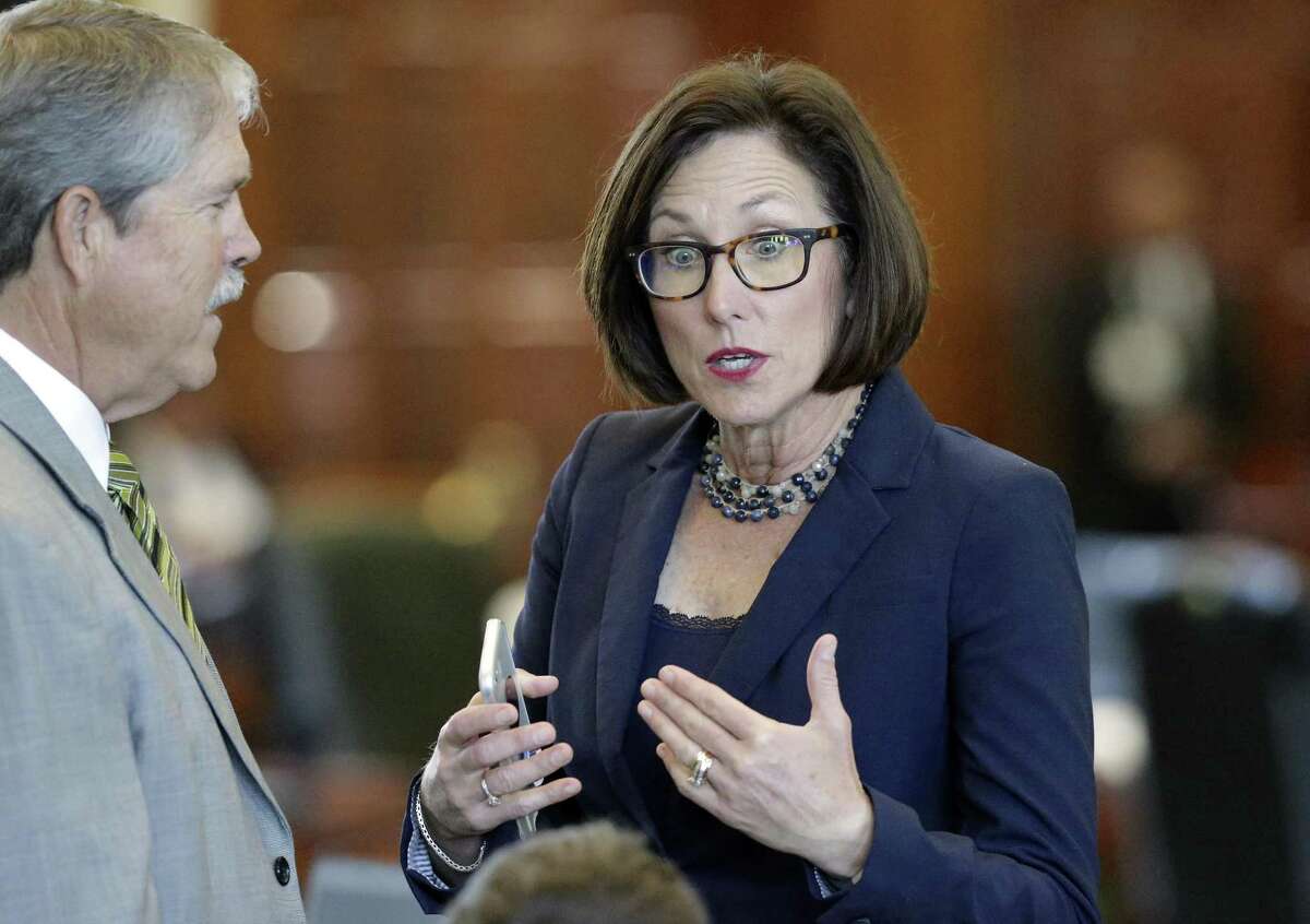 Senator Lois Kolkhorst, R-Brenham, argues a point on the floor with Senator Larry Taylor, R-Friendswood, during the the special session on July 26, 2017.