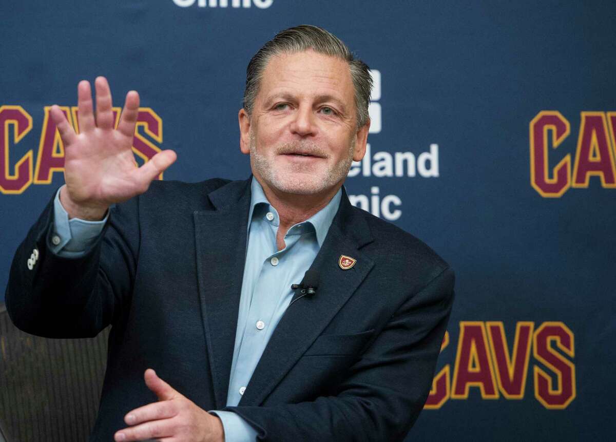Cleveland Cavaliers chairman Dan Gilbert answers questions about Cavalier's Kyrie Irving's demand to be traded during an NBA basketball news conference at the team's training facility in Independence, Ohio, Wednesday, July 26, 2017. (AP Photo/Phil Long)