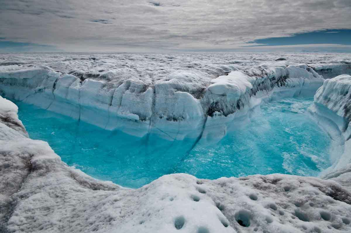 This July 4, 2012 image provided by Ian Joughin, shows surface melt water rushing along the surface of the Greenland Ice Sheet through a supra-glacial stream channel, southwest of Ilulissat, Greenland. Polar ice sheets are now melting three times faster than in the 1990s, but so far that's added just less than half an inch to already rising global sea levels, a new giant scientific study says. While the amount of sea level rise isn't as bad as some earlier worst case scenarios, the acceleration of the melting, especially in Greenland, has ice scientists worried. (AP Photo/Ian Joughin)