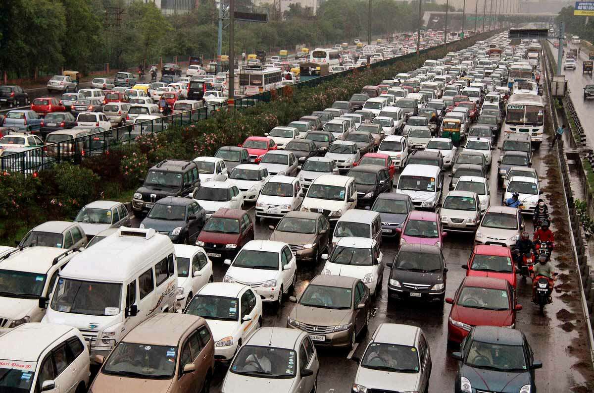 A traffic jam following power outage and rains at the Delhi-Gurgaon road on the outskirts of New Delhi, India, Tuesday. India's energy crisis cascaded over half the country Tuesday when three of its regional grids collapsed, leaving 620 million people without government-supplied electricity in one of the world's biggest-ever blackouts. Associated Press