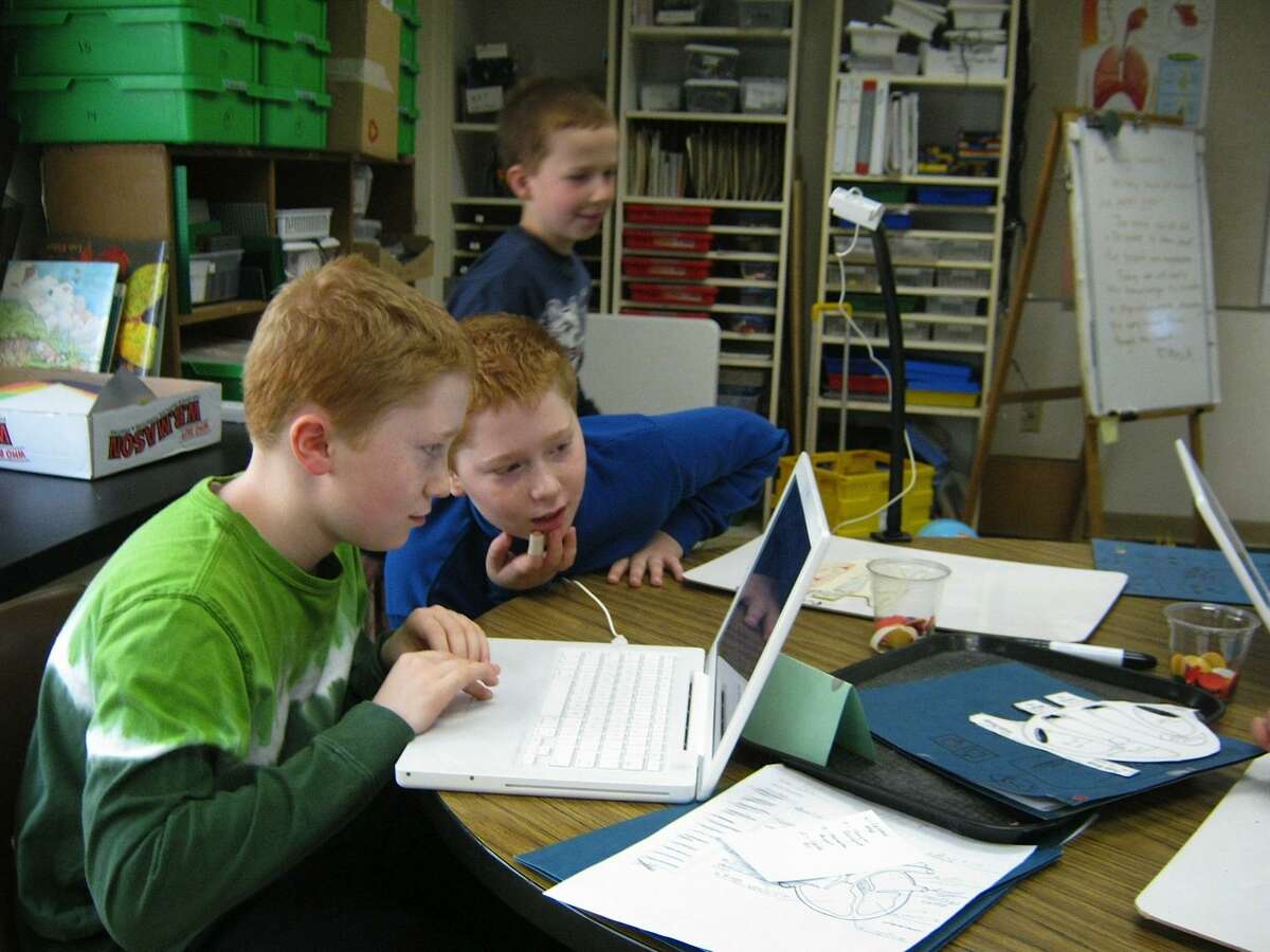Submitted photo Eli and Caleb Dorf, of East Haddam, are enjoying working together on their SAM project.