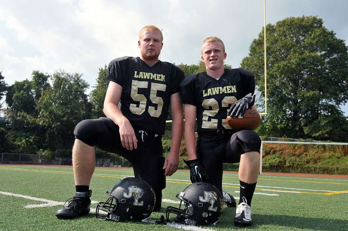 Milford-- Law High Captains George Knoth, left, and Tim Speer, . Photo Peter Casolino/New Haven Register 09/27/12