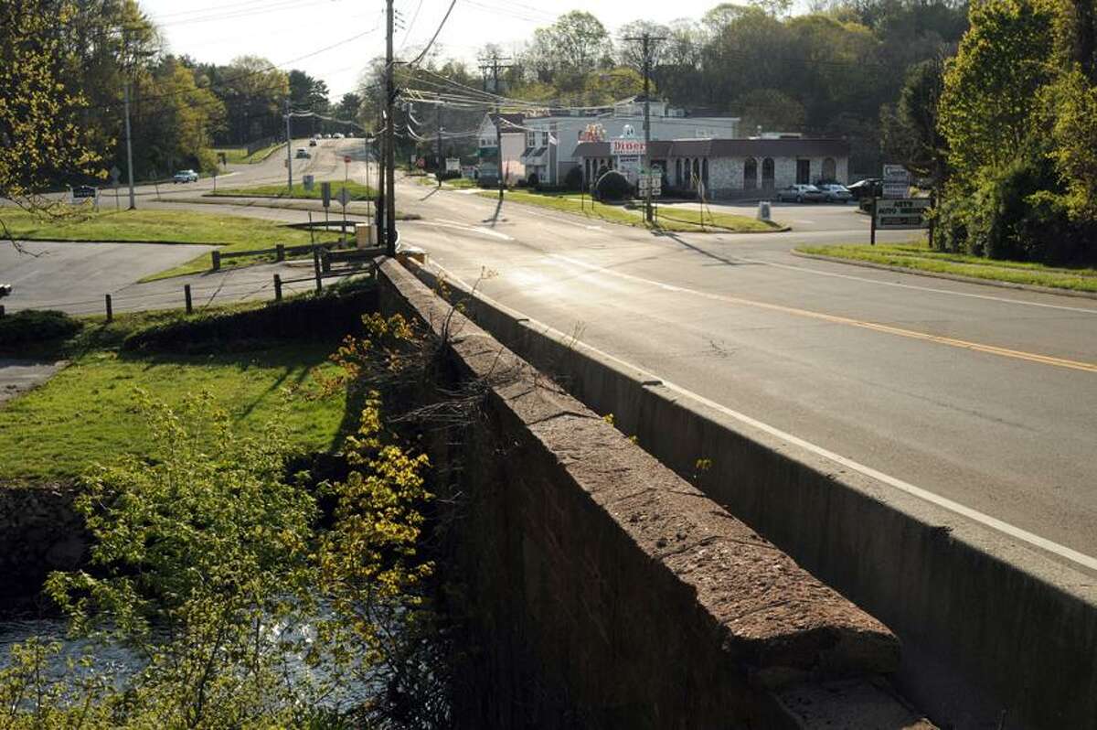 The Farm River Bridge along Main Street in East Haven , built in 1876 and considered a landmark by many East Haven residents, will be no more, according to proposed the Connecticut Department of Transportation design plans for the replacement of the bridge and realignment of the intersection of routes 1 and 100 to help reduce accidents and improve traffic flow near the Twin Pines Diner and Twin Pines Business Center. t4/25/12. Photo by Peter Hvizdak / New Haven Register.