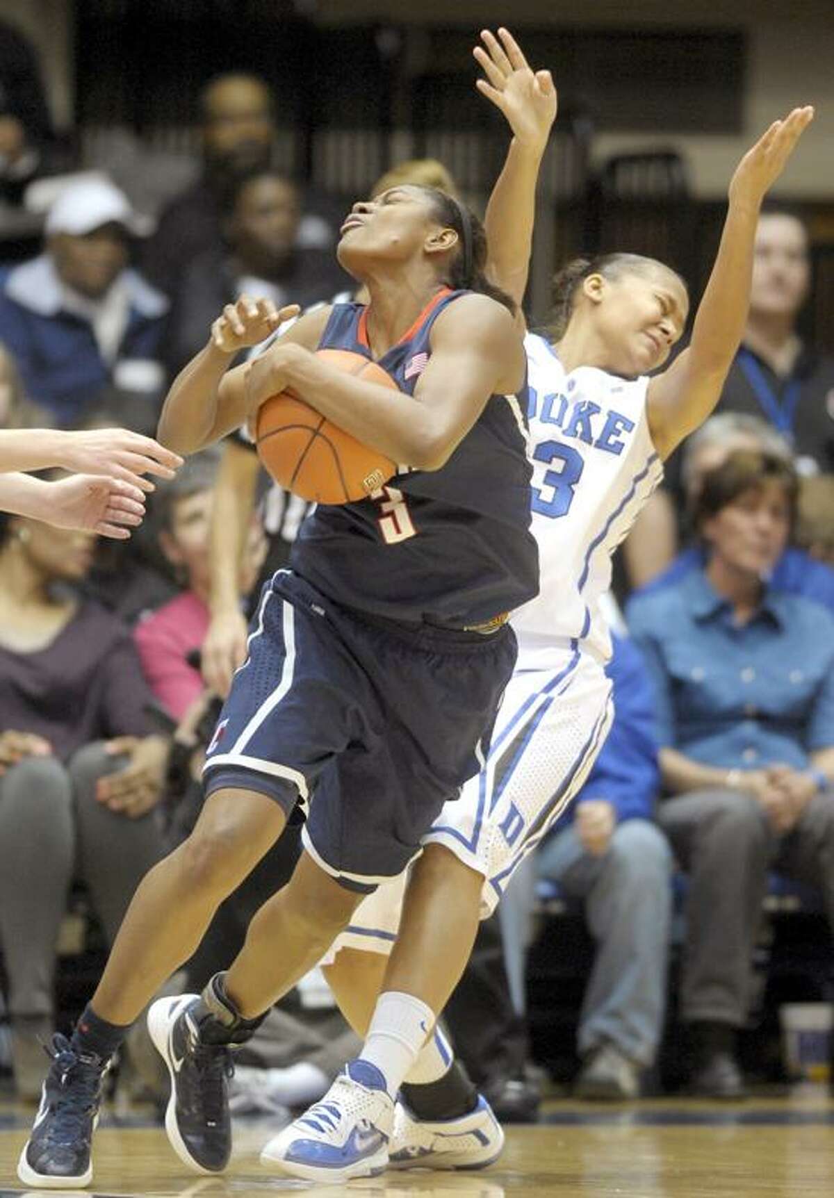 Duke's Shay Selby (3) collides Connecticut's Tiffany Hayes (3) during the first half of an NCAA women's college basketball game, Monday, Jan. 30, 2012, in Durham, N.C. (AP Photo/Sara D. Davis)