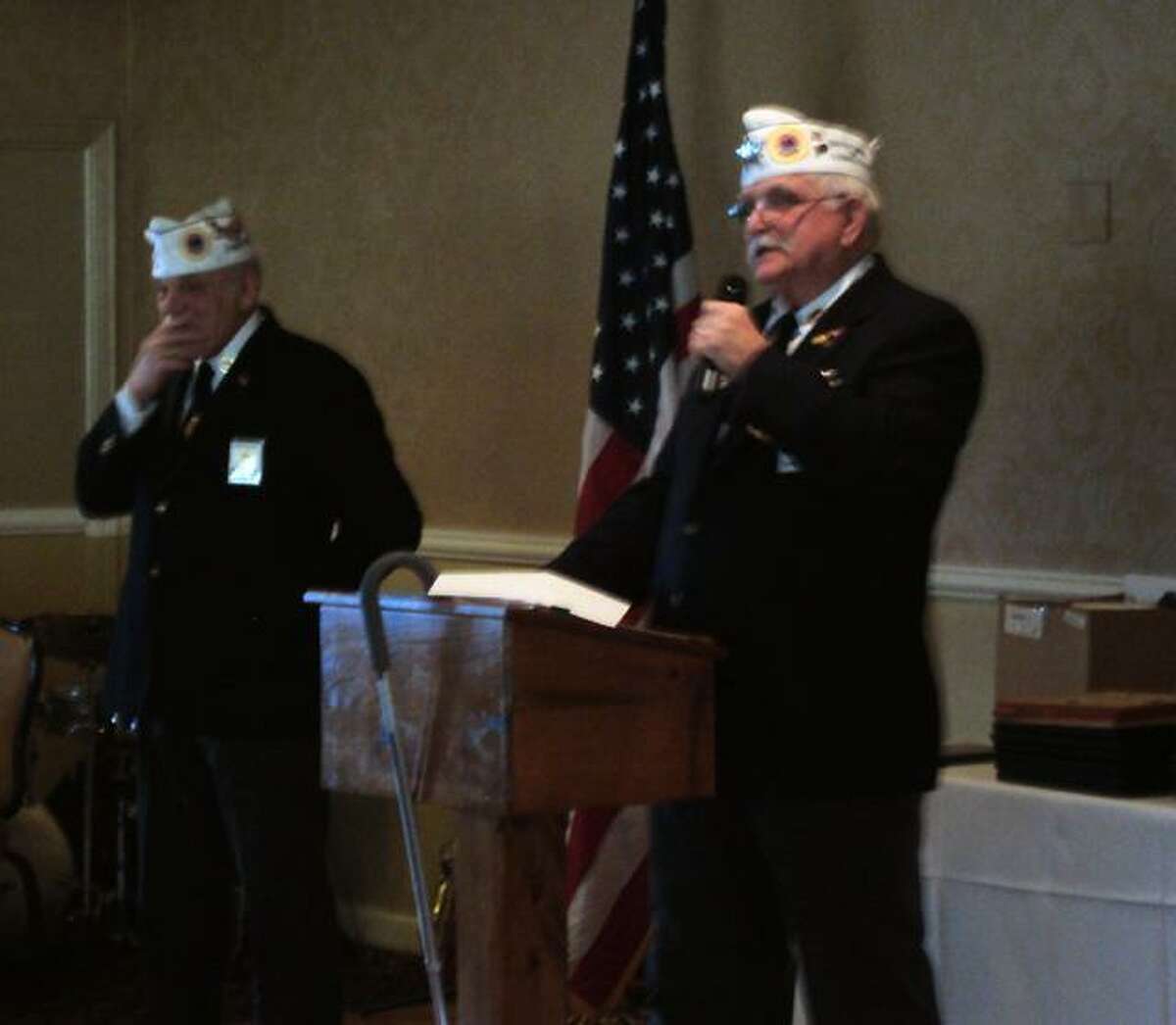RICKY CAMPBELL/ Register Citizen American Veterans Post 24 Commander Frank Dlugokinski made announcements Sunday during the organization's annual awards dinner at P. Sam's Bar and Grill in Torrington.