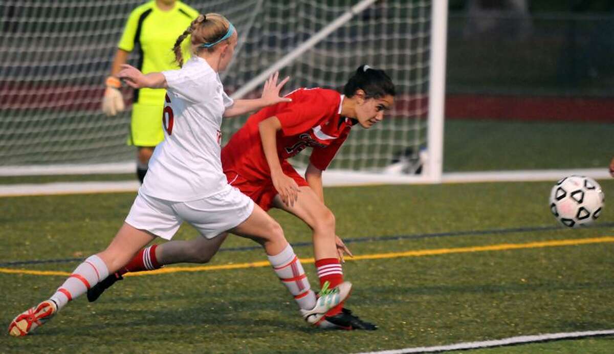 Action from an SCC girls' soccer match involving Cheshire and Wilbur Cross.