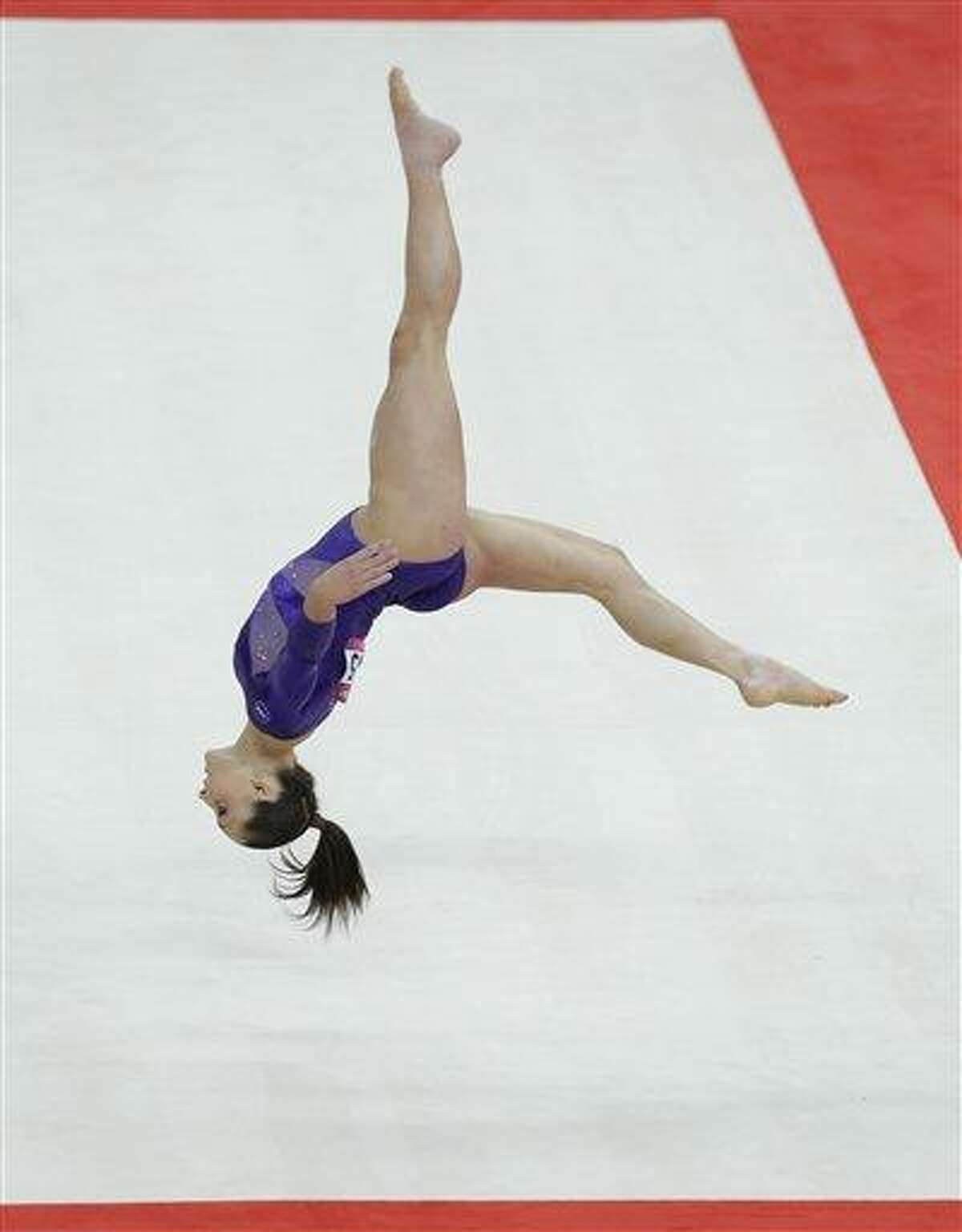 U.S. gymnast Jordyn Wieber performs on the floor during the Artistic Gymnastic women's qualifications at the 2012 Summer Olympics Sunday in London. Associated Press