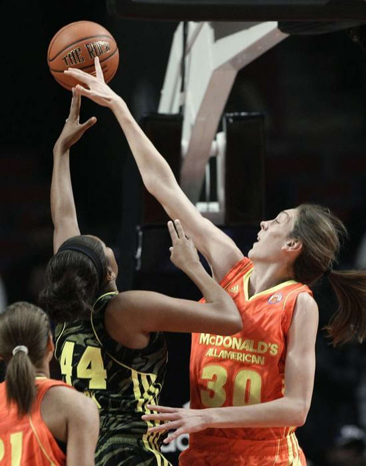 East's Breanna Stewart,(30) from North Syracuse, N.Y., blocks the shot of West's Morgan Tuck (44) from Bolingbrook, Ill., during the first half of the McDonald's All-American girls' basketball game in Chicago, Wednesday, March 28, 2012. (AP Photo/Nam Y. Huh)