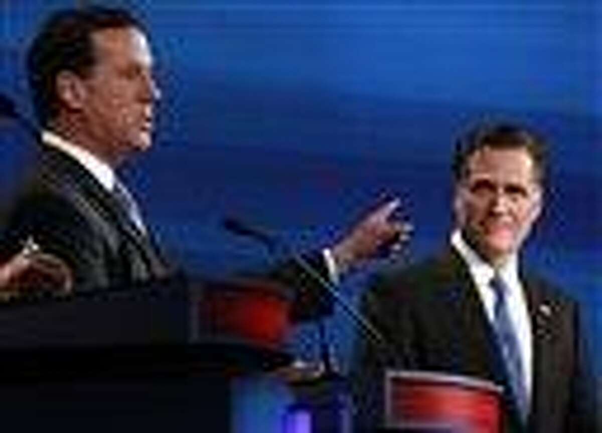 In this January file photo, former Pennsylvania Sen. Rick Santorum counters former Massachusetts Gov. Mitt Romney, right, during the South Carolina Republican presidential debate in Myrtle Beach, S.C. Associated Press