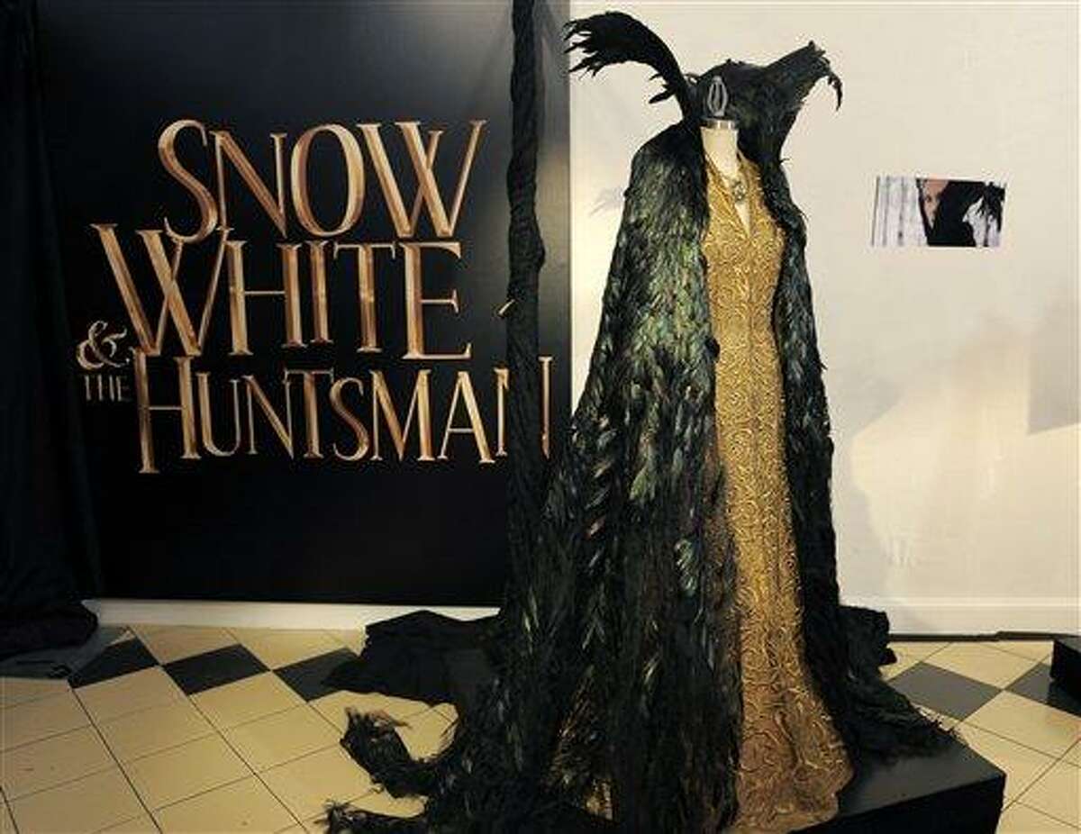 This photo shows a costume from the film "Snow White and the Huntsman" in Los Angeles. The costume, designed by Academy Award-winning costume designer Colleen Atwood, was worn by actress Charlize Theron in the film. (AP)