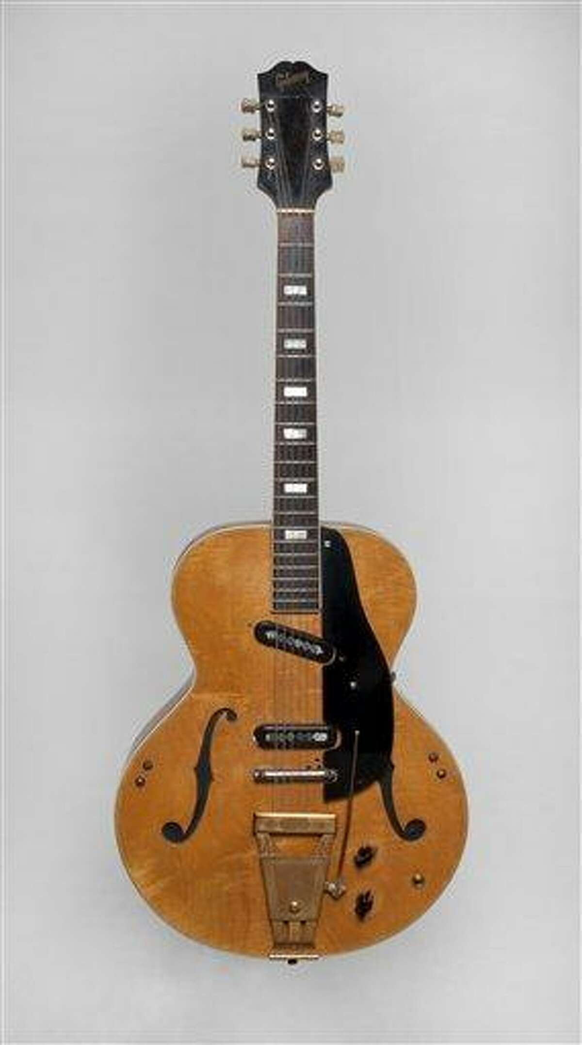 This undated image released by Julien's Auctions shows Les Paul's 1940s Epiphone Zephyr 7133 Klunker Guitar. This item is part of Les Paul's guitars and recording gear up for auction at Julien's Auctions from June 8 to June 10 in Beverly Hills, Calif. Associated Press