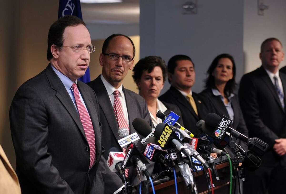 From left to right, David B. Fein, U.S. Attorney for the District of Connecticut; Thomas E. Perez, Assistant Attorney General in charge of the Civil Rights division; and Janice K. Fedarcyk, Assistant Director in charge of the New York office of the FBI announced the arrests of four East Haven police officers after an investigation into civil rights abuses by the accused officers. The press conference was held at the U.S. Attorney's Office in Bridgeport. Peter Casolino/Register