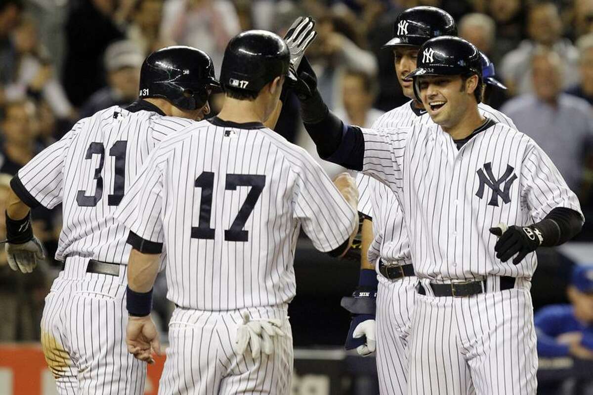 New York Yankees right fielder Ichiro Suzuki runs on the field