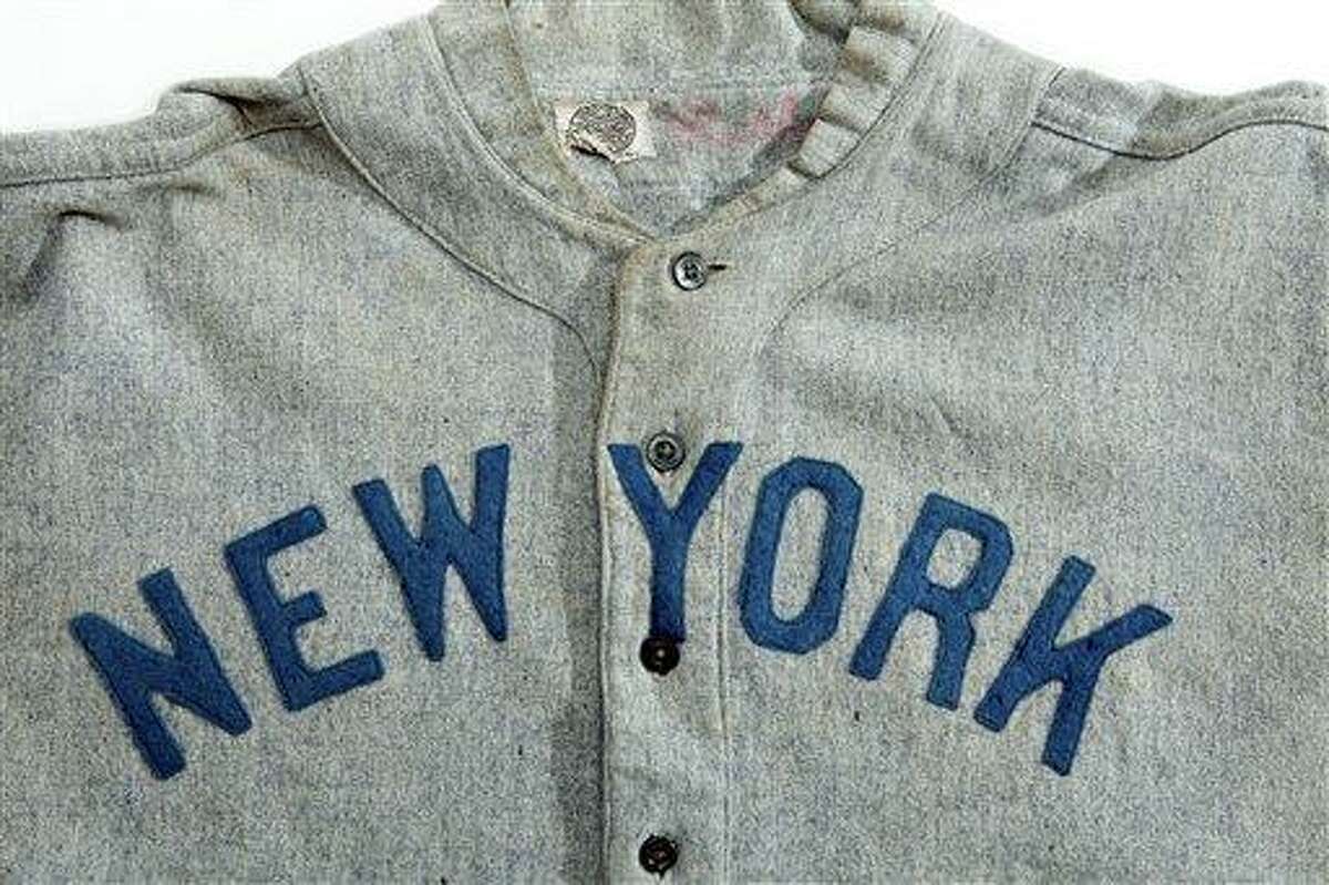 This undated photo provided by SCP Auctions shows a circa 1920 New York Yankees baseball jersey worn by Babe Ruth that sold for more than $4.4 million at auction, Sunday, May 20, 2012. SCP Auctions says the uniform top is the earliest known jersey worn by Ruth and set a record for any item of sports memorabilia. (AP Photo/SCP Auctions)