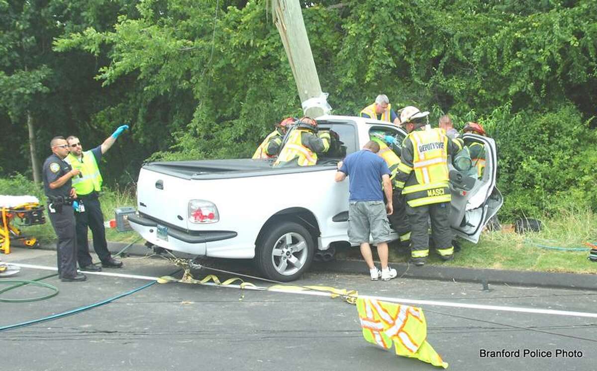 Driver extricated from truck after crash in Branford