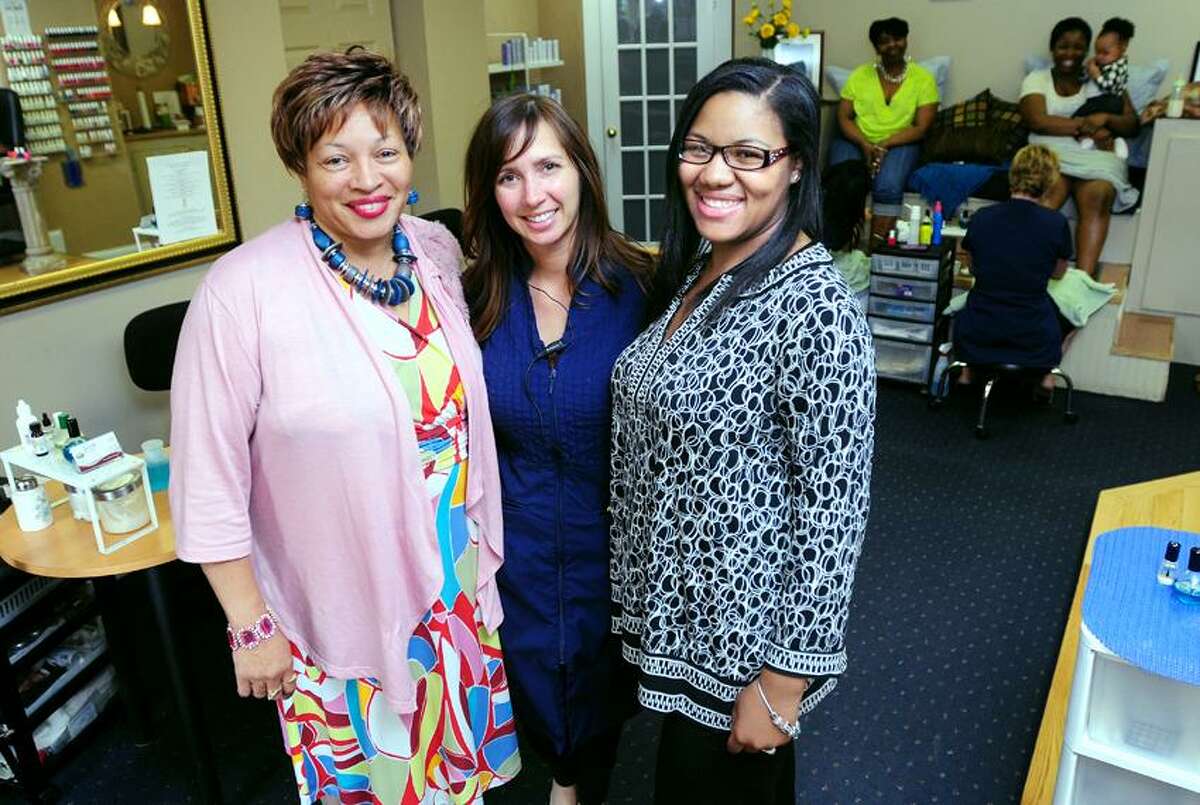 Pamela Monk Kelley (left) is photographed with her daughter, LaShante James (right) and Sheila Bonanno (center), owner of the Joiya Day Spa & Hair Designs, in Hamden on 5/11/2012.Photo by Arnold Gold/New Haven Register AG0448E