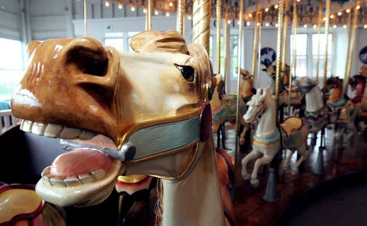 The carousel horse, Fancy Prancy (left), built in 1911 is photographed at Lighthouse Point Park in New Haven on 5/9/2012.Photo by Arnold Gold/New Haven Register AG0448C