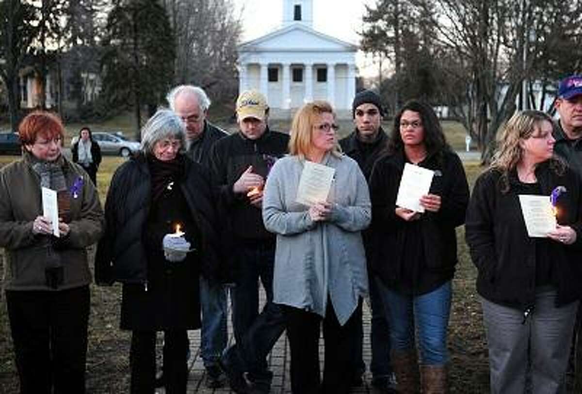 The late Barbara Hamburg's mother, Barbara Lund (second from left), along with family and friends take part in a vigil on the Green in Madison marking the second anniversary of her murder on 3/3/2012.Photo by Arnold Gold/New Haven Register AG0441E