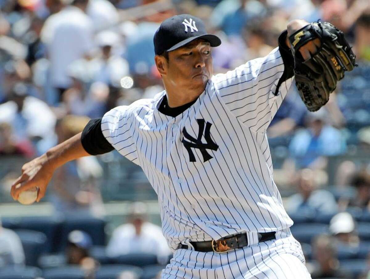 New York Yankees starter Hiroki Kuroda, of Japan, delivers a pitch to the Chicago White Sox during the first inning of a baseball game, Saturday, June 30, 2012, at Yankee Stadium in New York. (AP Photo/Bill Kostroun)