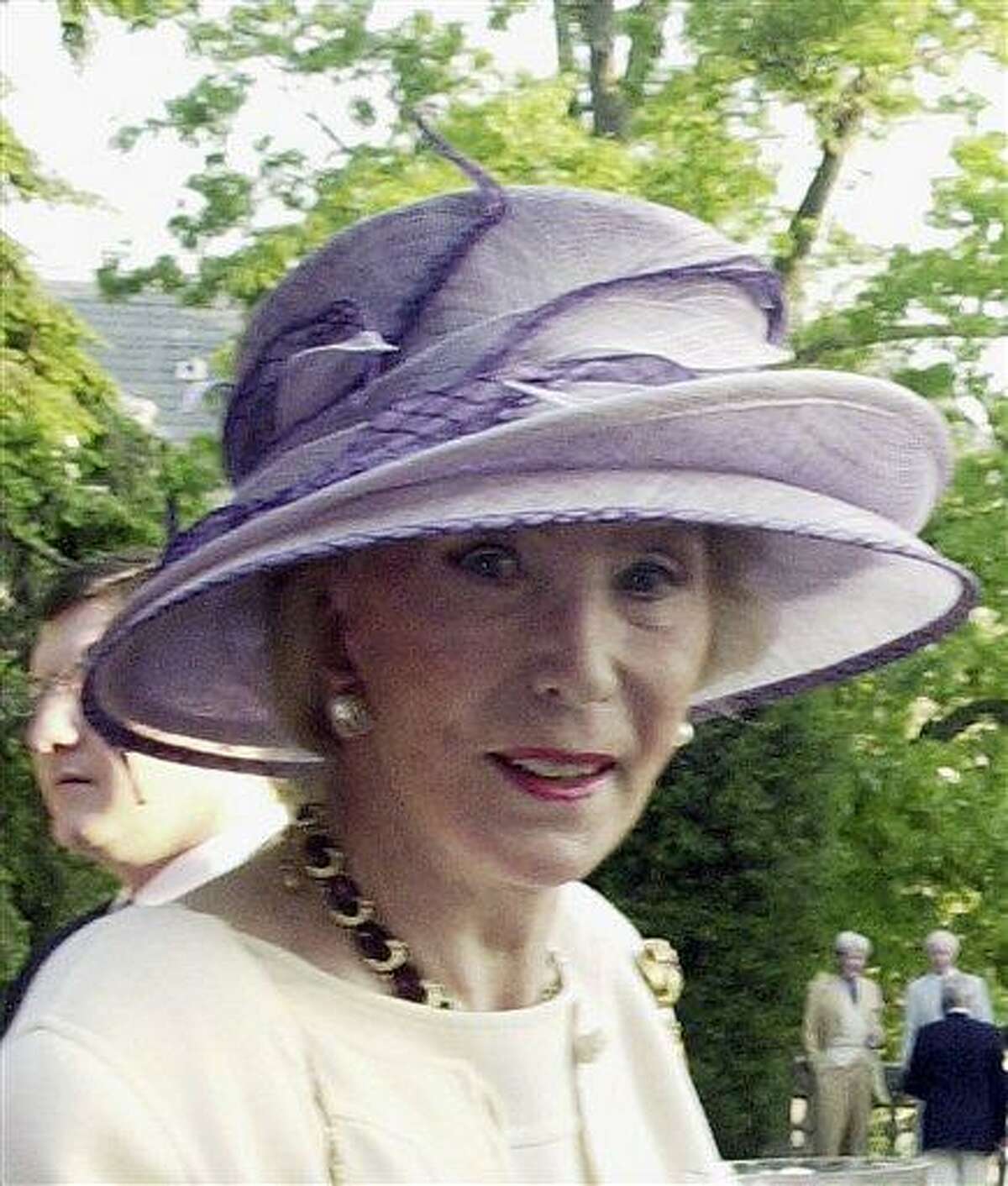 This 2004 photo shows German socialite Viola Drath during the annual Woodrow Wilson home garden party and hat contest in Washington. A murder case involving a 91-year-old Washington socialite and her much-younger husband has taken a series of bizarre turns. Associated Press