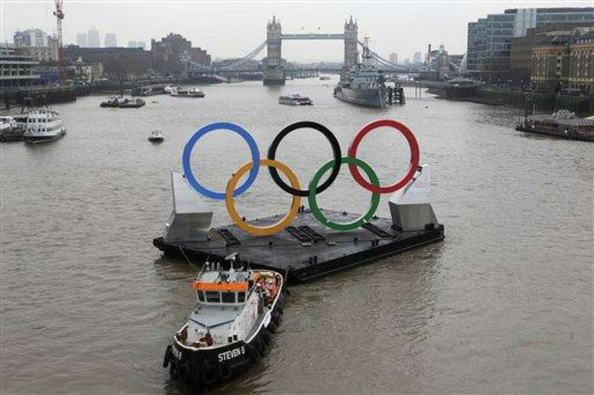 Backdropped by the historic Tower Bridge, giant Olympic rings float on the River Thames in London in the run-up for the games. Associated Press