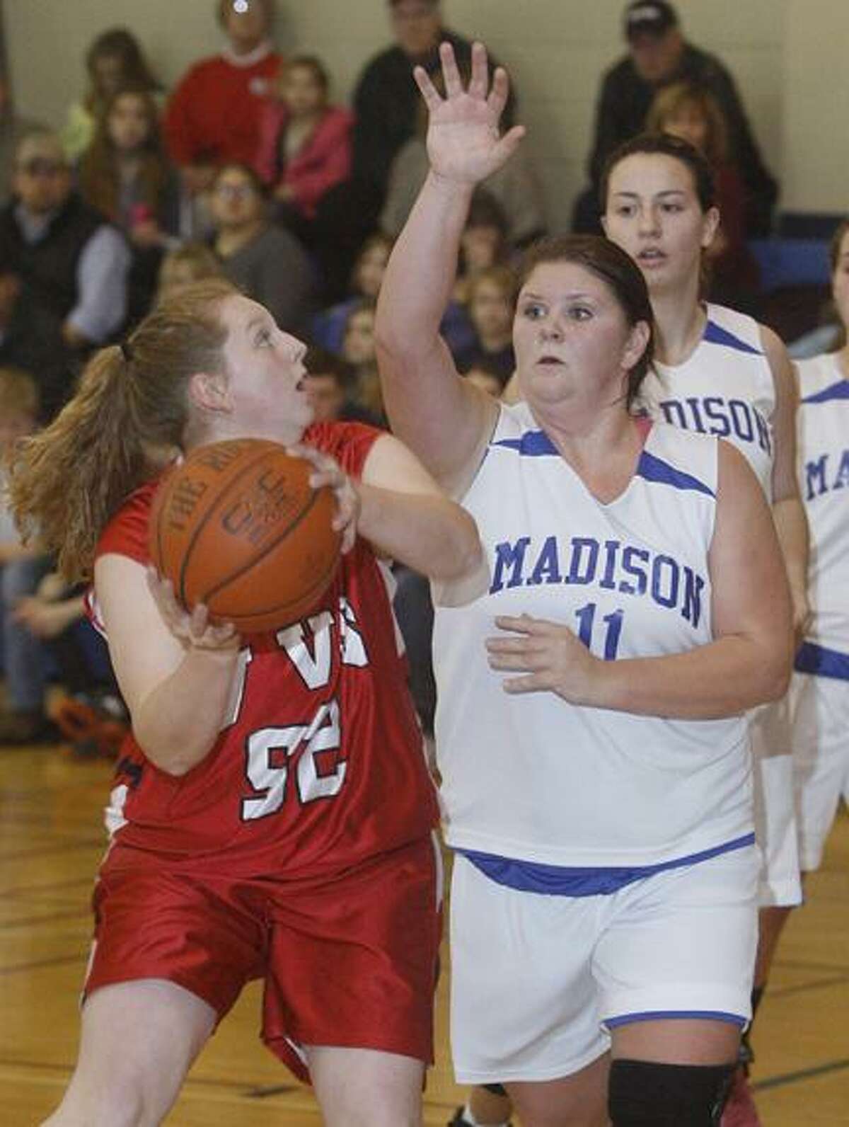 Dispatch Staff Photo by JOHN HAEGER (Twitter: @OneidaPhoto) Madiosn's Shana Biedermann (11) defends VVS' Claire Richardson (52) during Madison's Christmas tournament last year. This year VVS and Madison are hosting girls basketball tournaments.