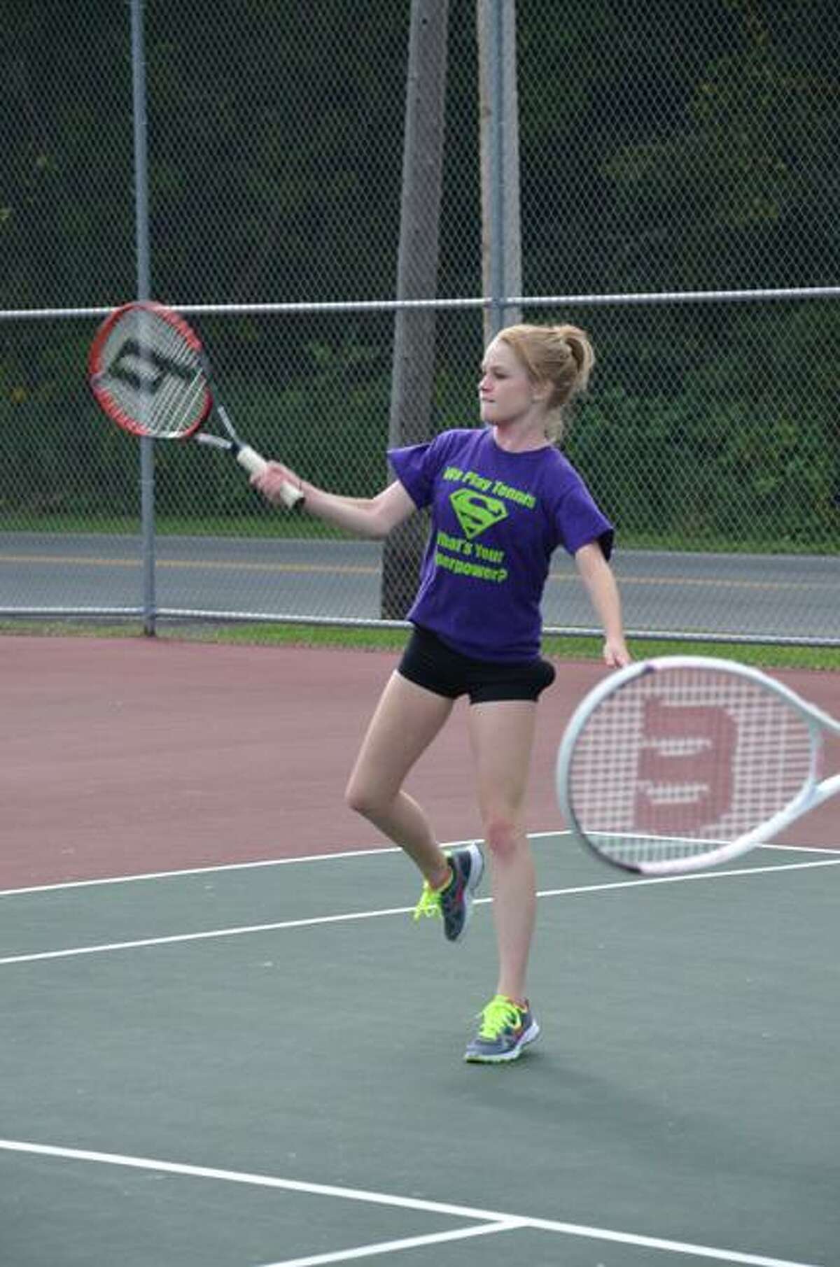 Dispatch Staff Photo by KYLE MENNIG Canastota's Megan Winters hits a tennis ball during practice Monday at the high school.