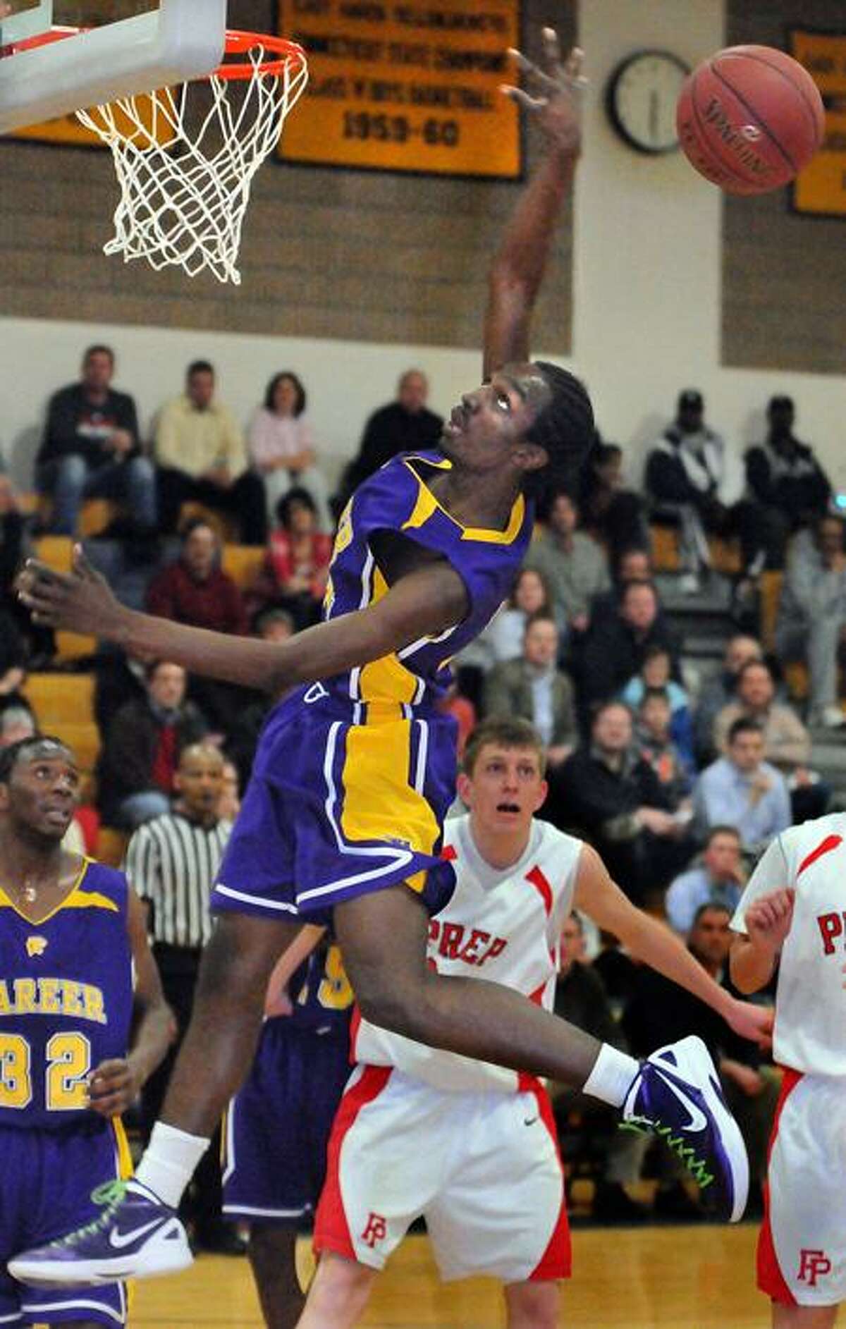 The SCC boys basketball semifinals at East Haven High School between Career of New Haven and Fairfield Prep. Career's Treyvon Moore up for two. Photo by Mara Lavitt/New Haven Register2/27/12