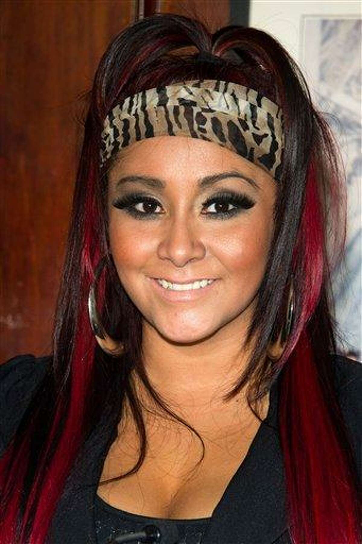 Nicole "Snooki" Polizzi gave birth to her first child early Sunday morning at Saint Barnabas Medical Center in Livingston, N.J., according to MTV. Associated Press file photo