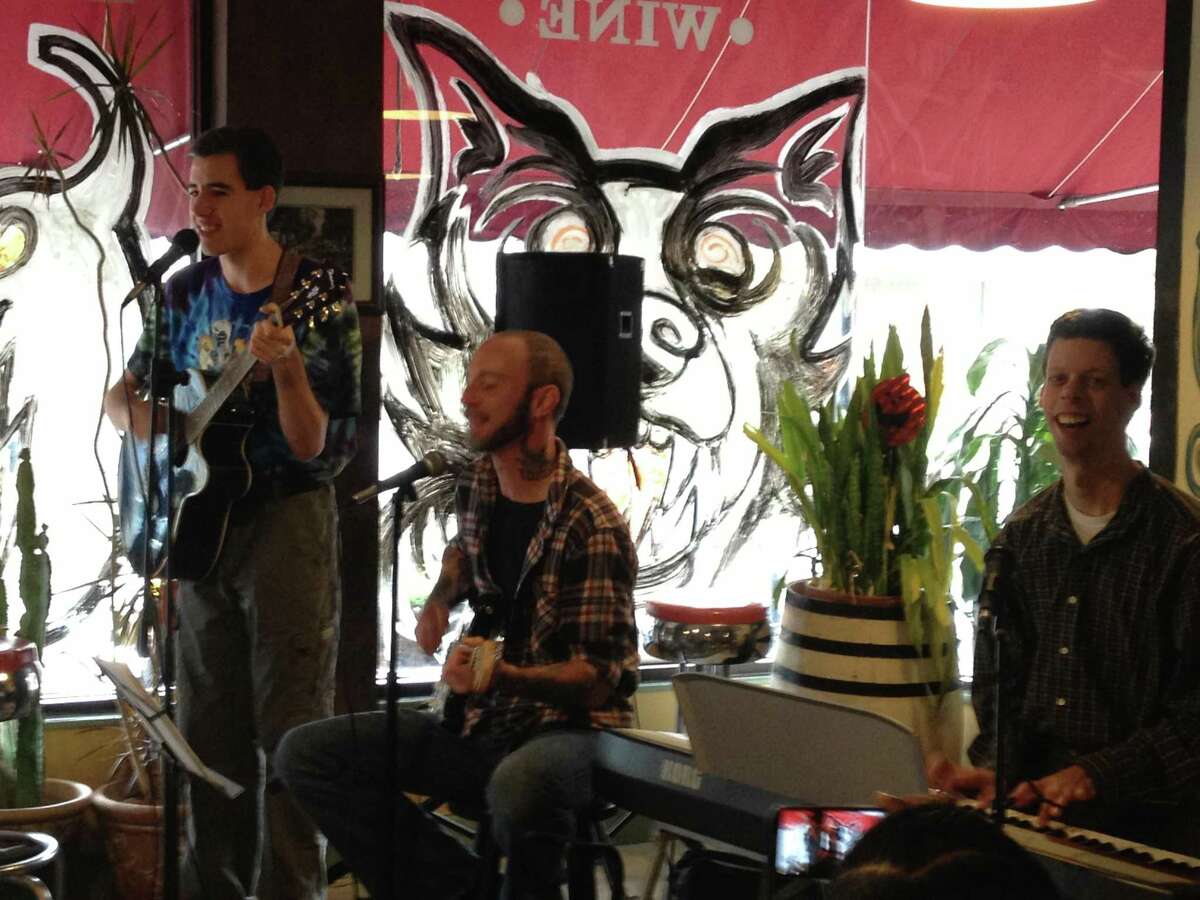 Submitted photo The Perfect Flaw members, guitarist Arty Johnson, FAVRAH Creative Arts Coordinator Rick Stanton and key board player Christian Lawson played seven songs at a flash mob band performance at LaSalle Market & Deli on Thursday.