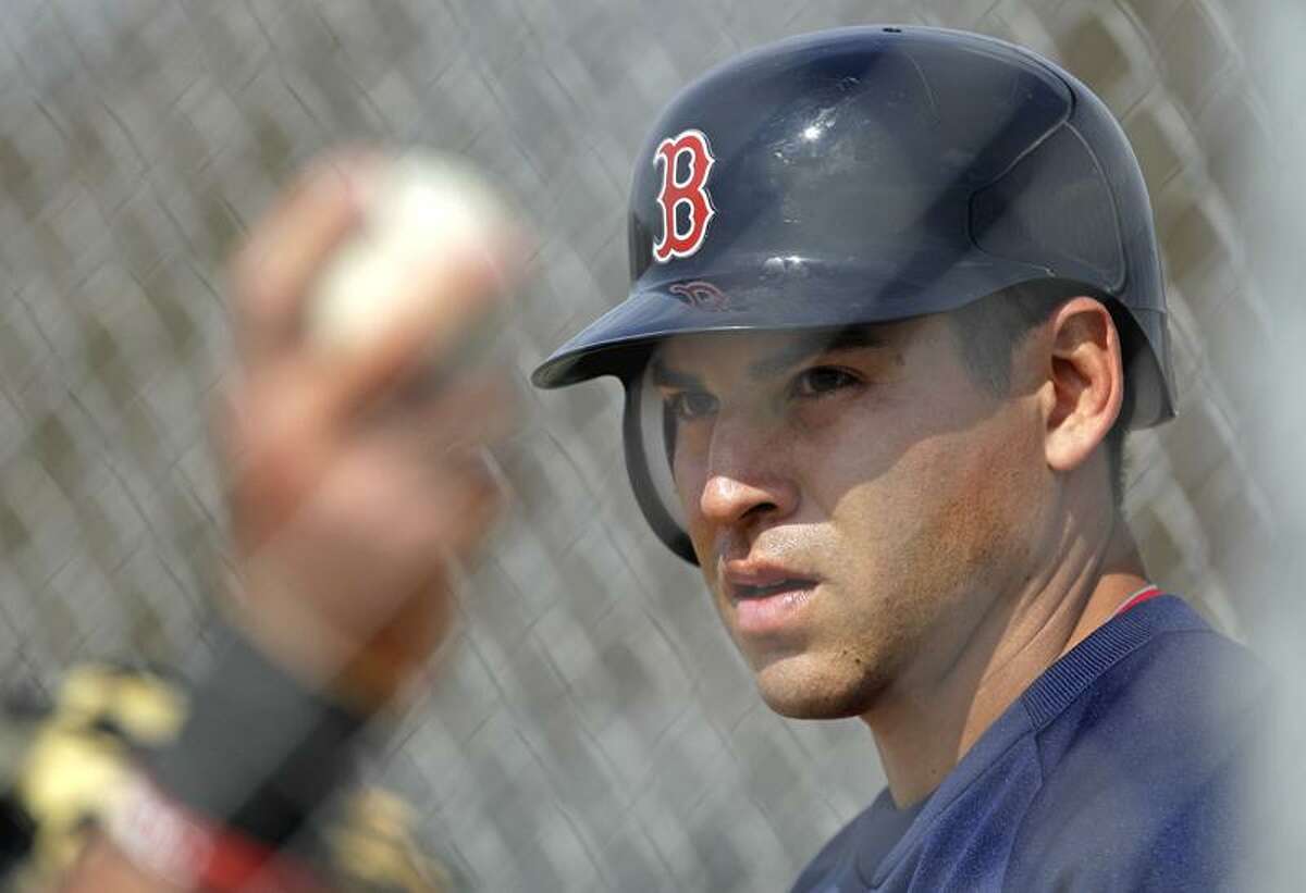 Boston Red Sox's Jacoby Ellsbury takes batting practice during a baseball spring training workout, Sunday, Feb. 26, 2012, in Fort Myers, Fla. (AP Photo/David Goldman)
