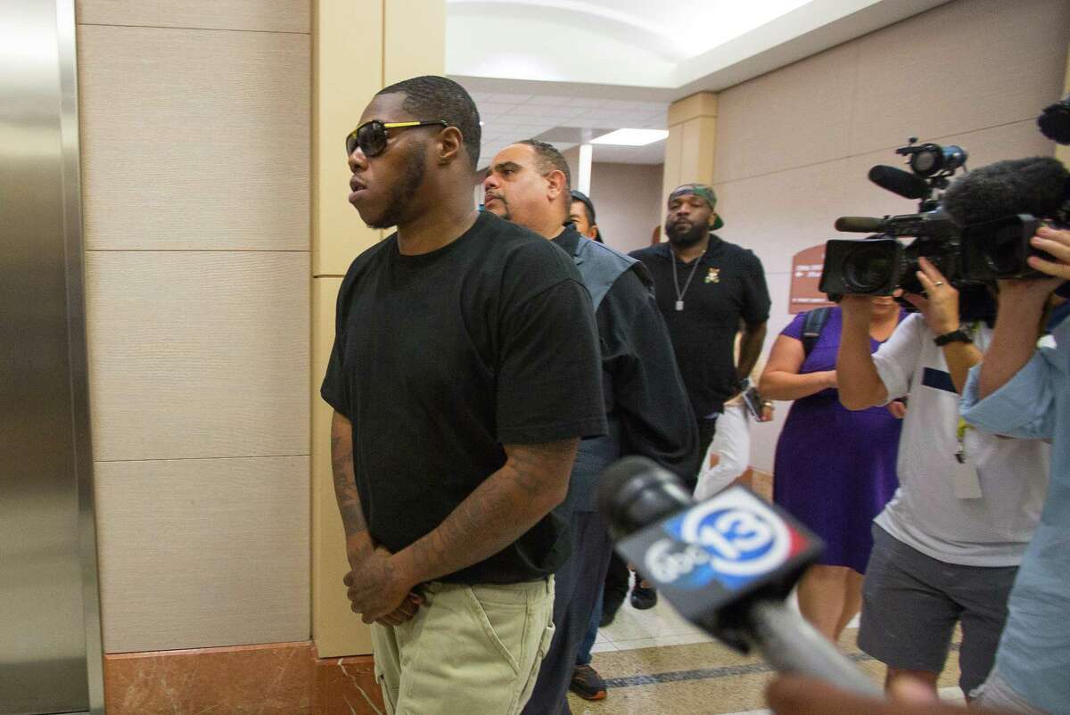 Houston rapper Joseph Wayne McVey, commonly known by "Z-Ro," leaves the 351st courtroom of the Harris County Courthouse Thursday, July 27 2017, in Houston. McVey is accused of beating his now ex-girlfriend Brittany Bullock, also known by her rapper stage name "Just Brittany," while brandishing a handgun in his Katy area home in April.