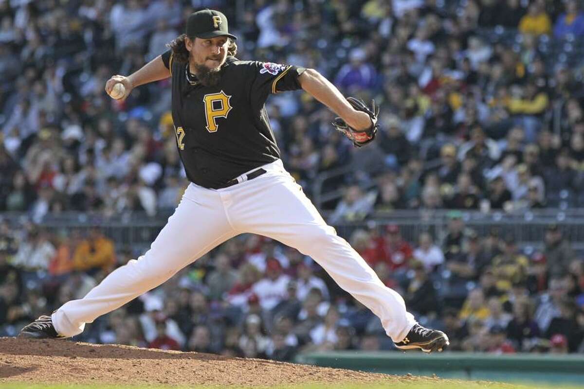 Pittsburgh Pirates closer Joel Hanrahan delivers during the ninth inning of a baseball game against the Cincinnati Reds in Pittsburgh Sunday, Sept. 30, 2012. The Reds won 4-3, with Hanrahan taking the lose. (AP Photo/Gene J. Puskar)