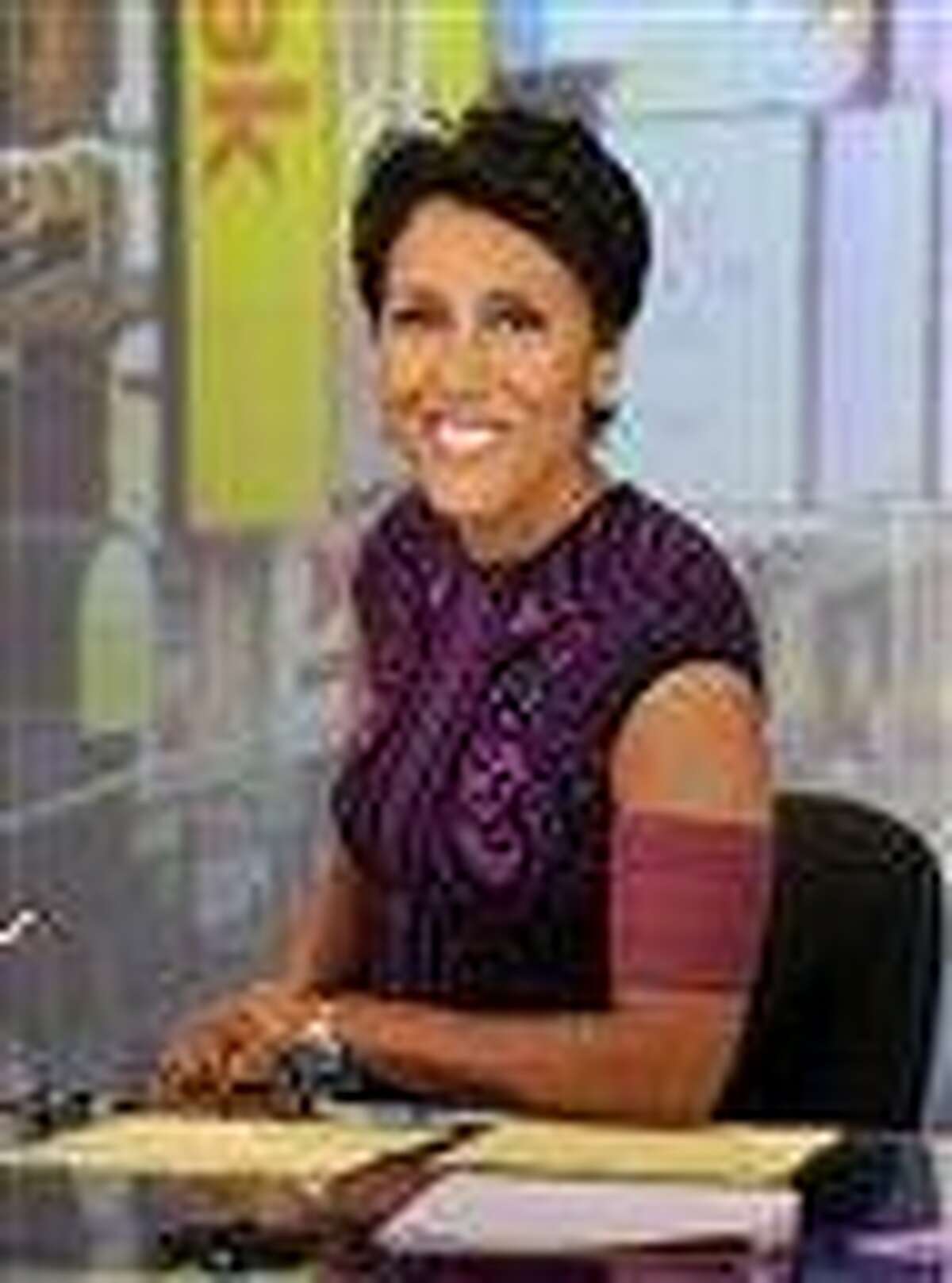 This image released by ABC shows co-host Robin Roberts wearing an armband that covers her pic line chemotherapy treatment on "Good Morning America" Tuesday. A national bone marrow donation registry says the rate of new registrants has more than doubled since ABC News' Robin Roberts said that she'll need a transplant. The "Good Morning America" anchor is being treated for MDS, a blood and bone marrow disease. She will require a transplant this fall. Associated Press