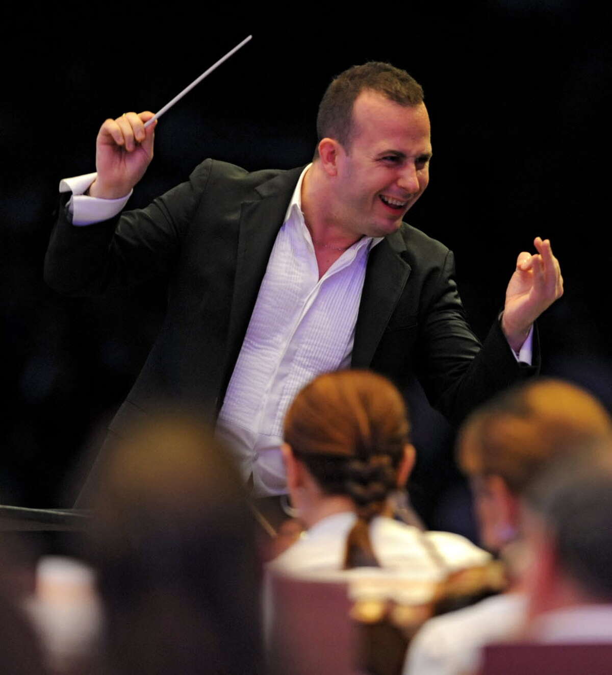 Music director Yannick Nezet-Seguin conducts the Philadelphia Orchestra at Saratoga Performing Arts Center Wednesday, Aug. 8, 2012 in Saratoga Springs, N.Y. This is Yannick Nezet-Seguin's first performance at SPAC. (Lori Van Buren / Times Union)