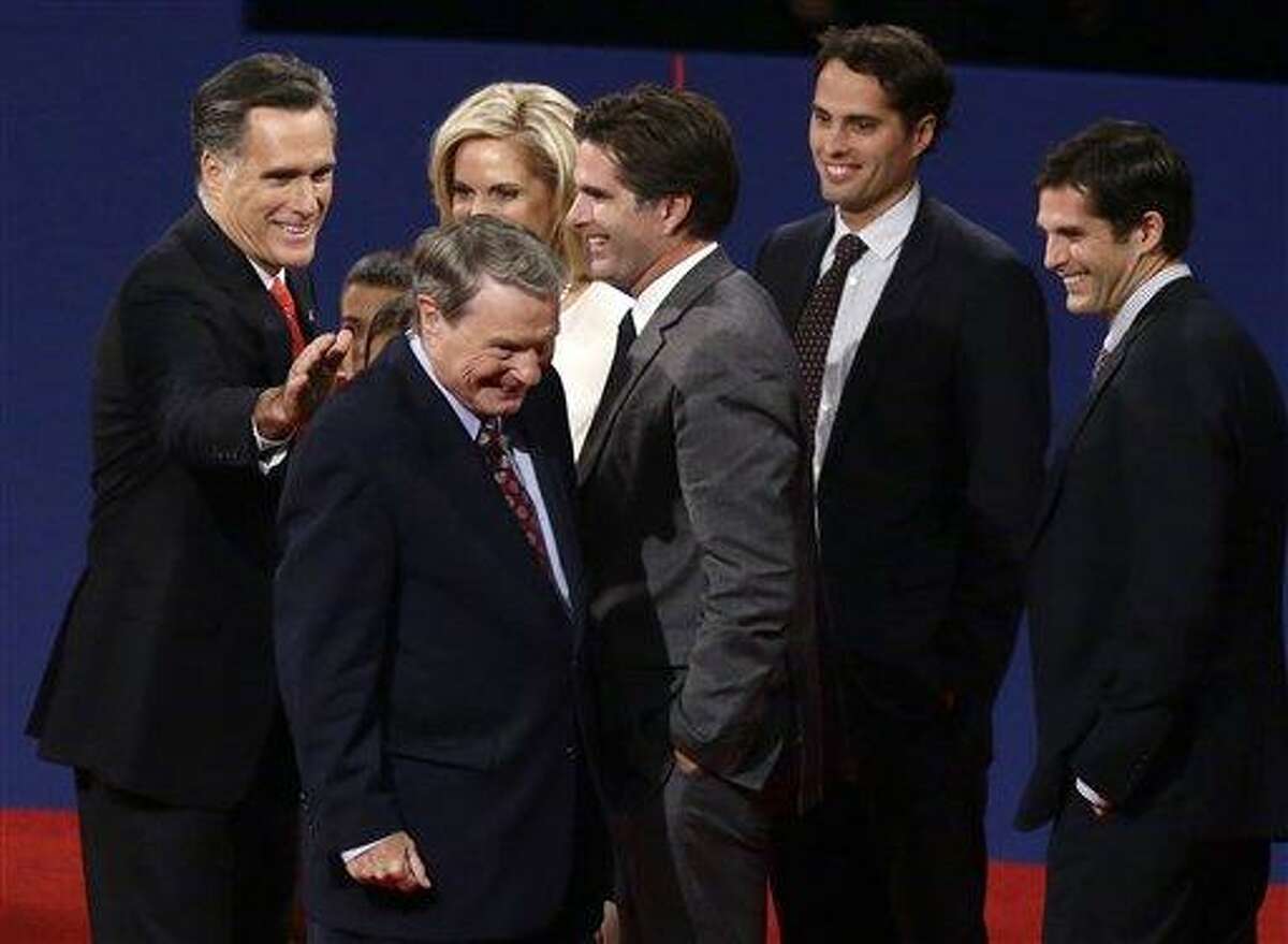 Republican presidential candidate, former Massachusetts Gov. Mitt Romney pats moderator Jim Lehrer on the back at the end of the first presidential debate with President Barack Obama in Denver. When it comes to debates, Mitt Romney loves the rules. AP Photo/Charles Dharapak