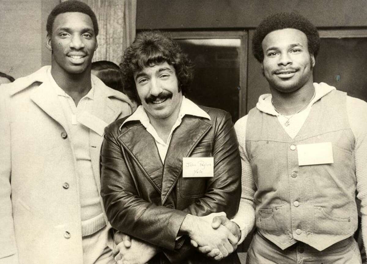 John Pagliaro, center, with fellow Walter Camp All-Americans Doug Williams of Grambling, at left, and Charles Alexander of LSU at the 1977 All-America awards dinner in New Haven. (Register file photo)