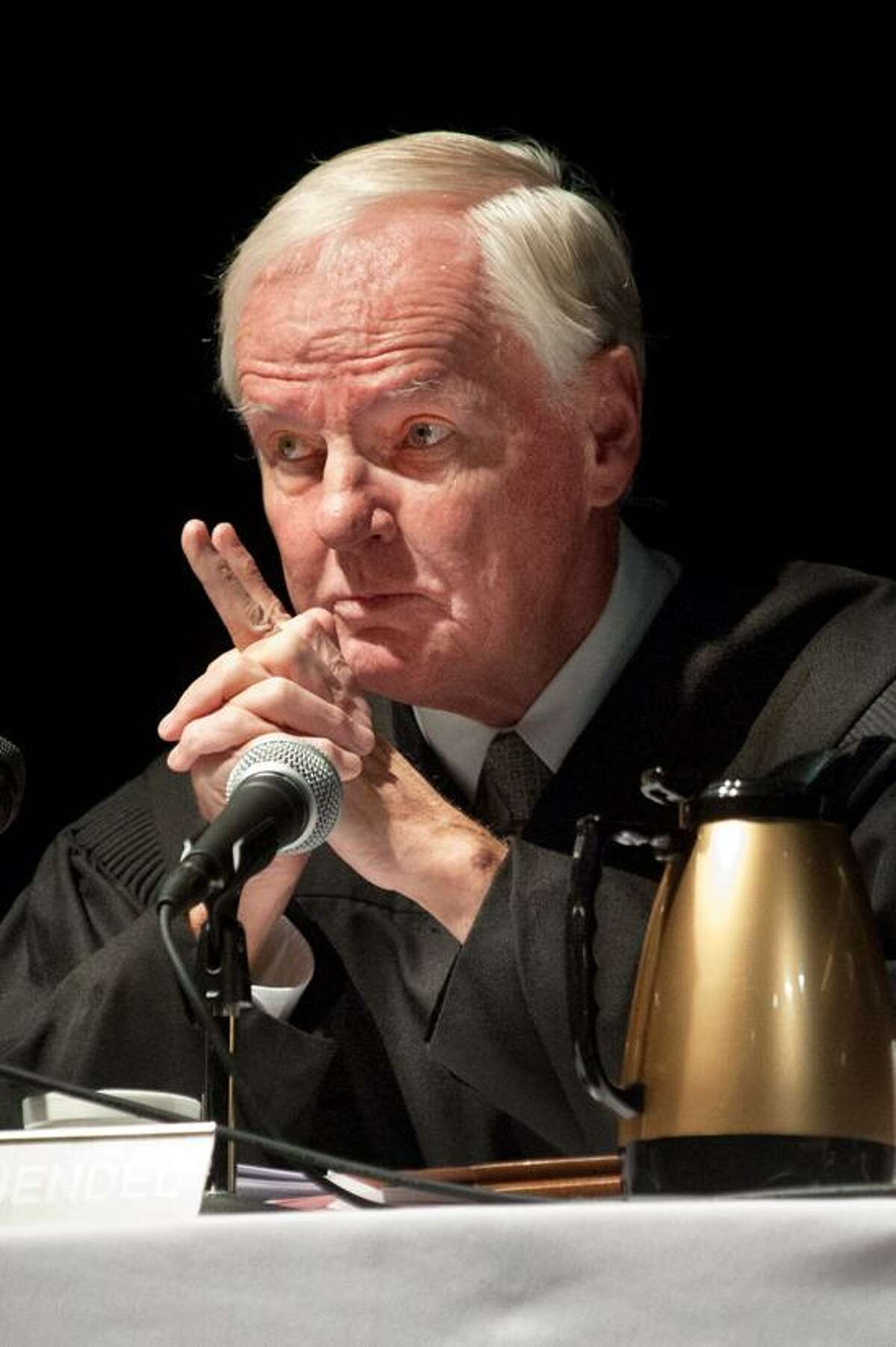 Appellate Court Judges F. Herbert Gruendel who organized the courts visit asks a question of one of the attorneys participating in The Connecticut Appellate Courts session that was held in the Branford High School Auditorium with hundreds of students in attendance Thursday, Octobet 18,2012. vm Williams