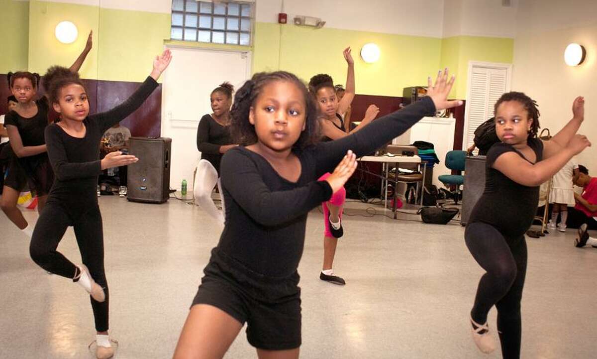 NEW HAVEN-Toe dancers rehearse at Dee Dee's Dance Studio. Girl in forground is Kelsey Rice,9. Melanie Stengel/Register
