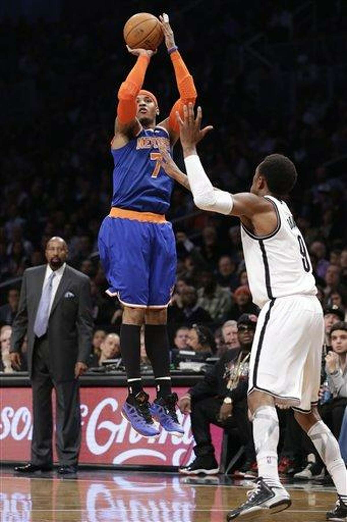 Charles Smith of the New York Knicks stands on the court during